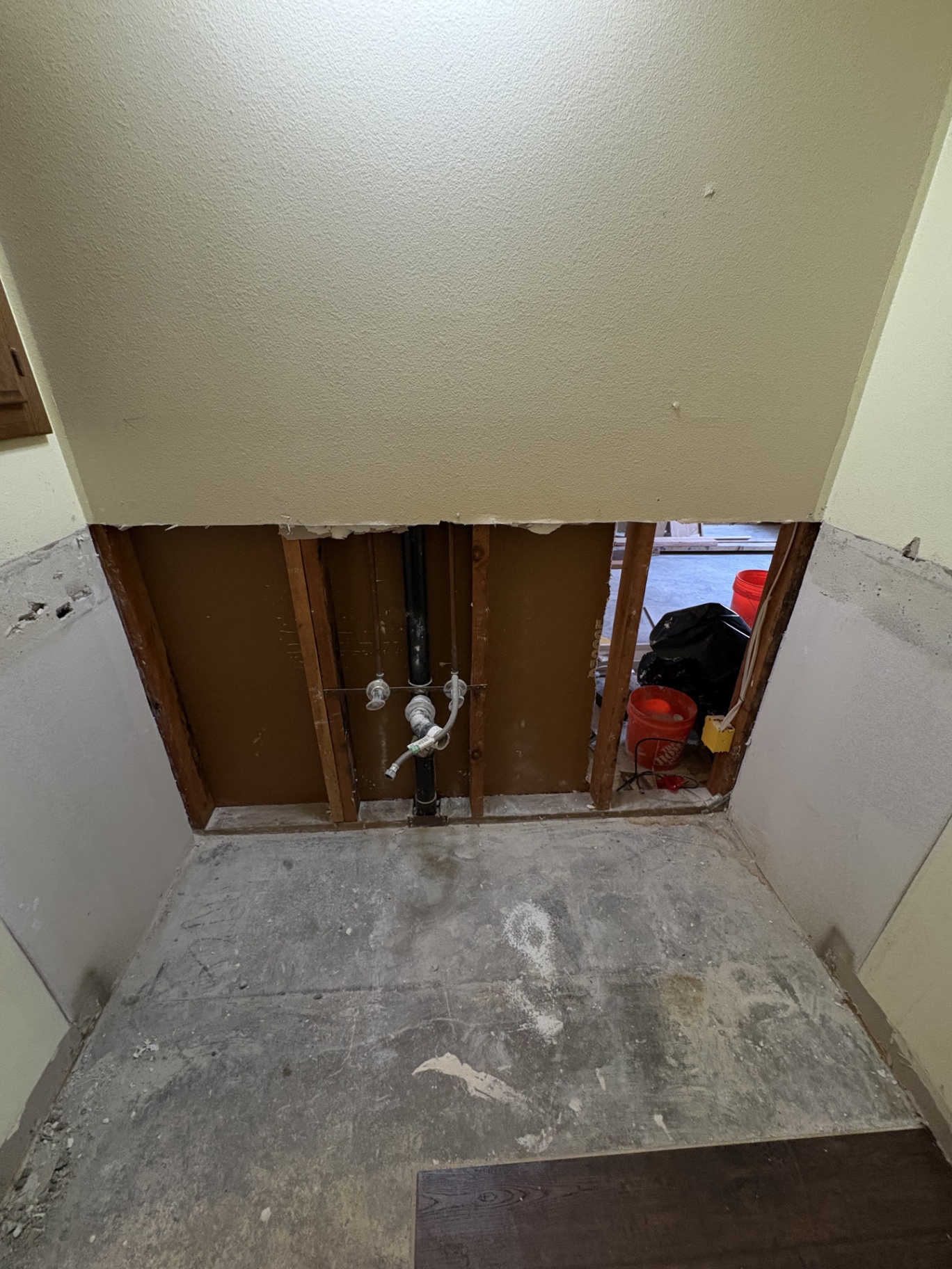 Wall opened for drain and supply line repair