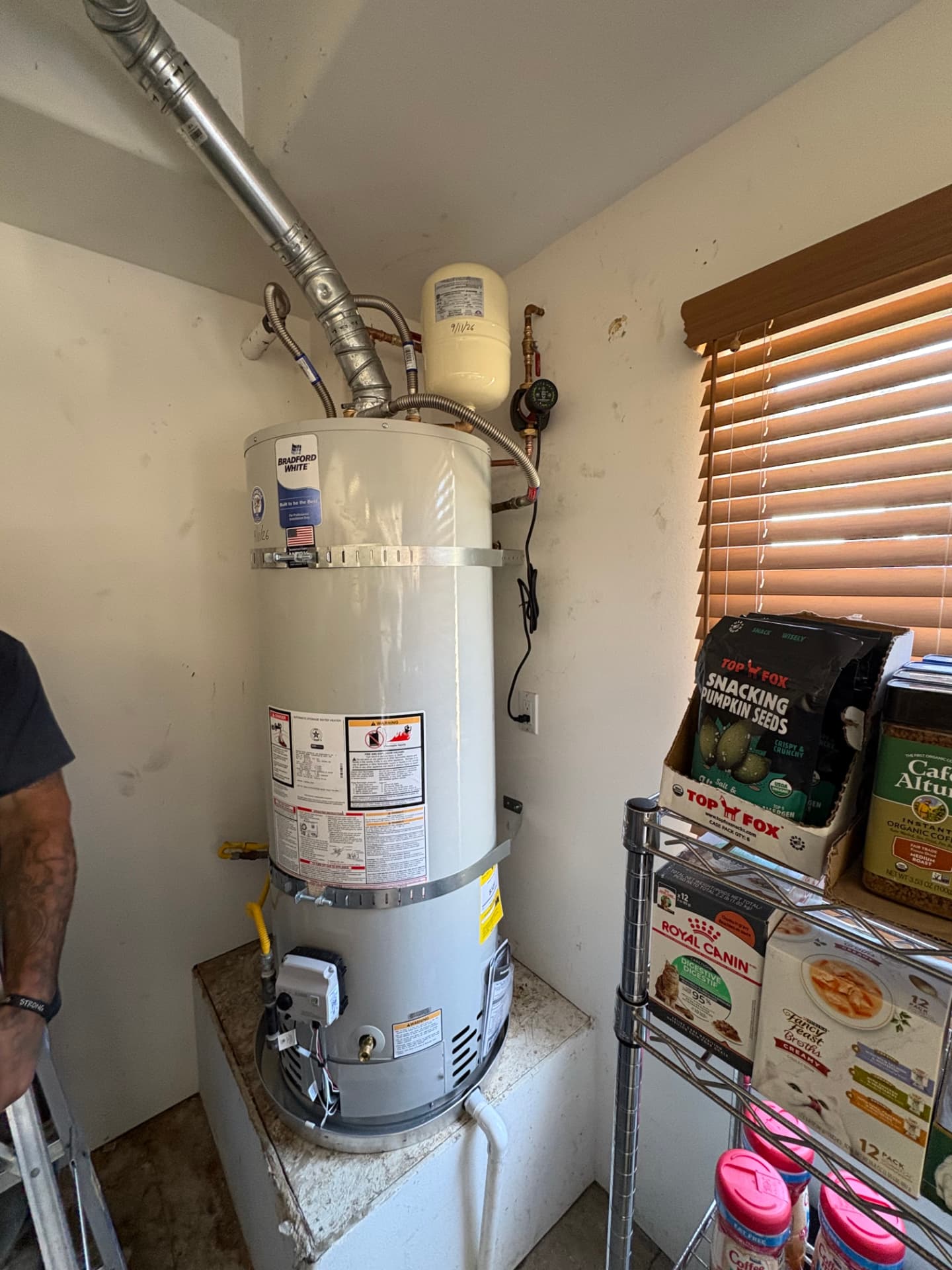 New Bradford White gas water heater with expansion tank in garage